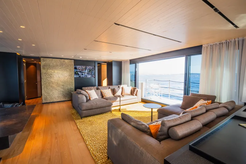 Le Gypsy Yacht Photos Pics Luxurious interior of 2018 Sanlorenzo 102A yacht with ocean view and modern furnishings.