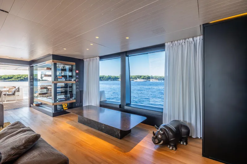 Le Gypsy Yacht Photos Pics Luxurious interior of 2018 Sanlorenzo 102A yacht with ocean view and modern decor.