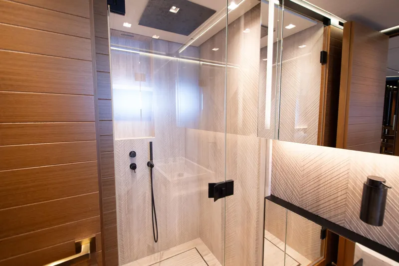 Le Gypsy Yacht Photos Pics Luxurious bathroom in 2018 Sanlorenzo 102A yacht with modern glass shower.