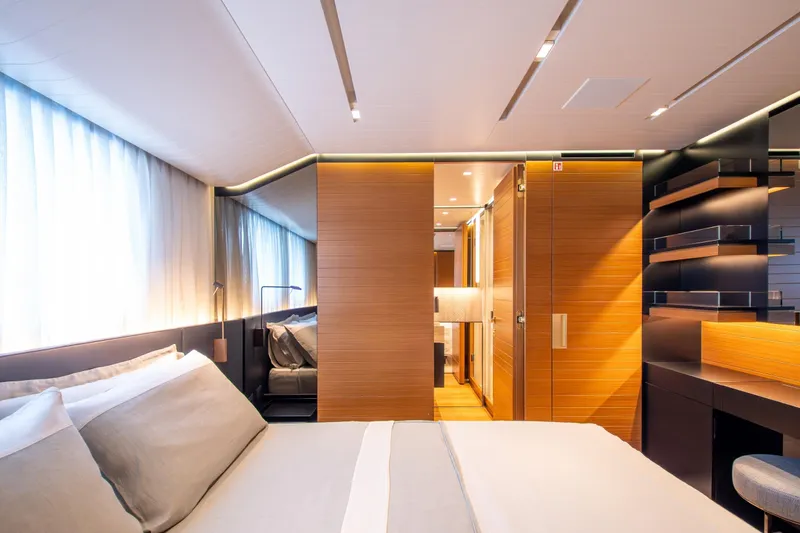 Le Gypsy Yacht Photos Pics Luxurious bedroom interior of 2018 Sanlorenzo 102A yacht with modern design and ambient lighting.