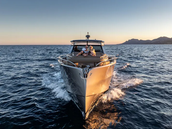 Virtus Yacht Photos Pics 2022 Steeler B50 AQUAZEN yacht cruising on open sea at sunset.
