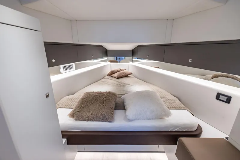Virtus Yacht Photos Pics Luxurious interior cabin of 2022 Steeler B50 AQUAZEN yacht with plush bedding.