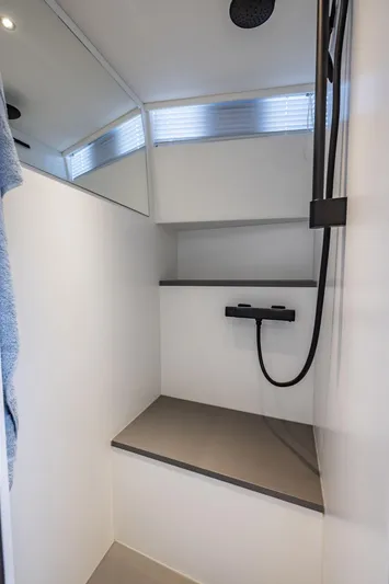 Virtus Yacht Photos Pics Modern shower area in 2022 Steeler B50 AQUAZEN yacht, featuring sleek design and fixtures.