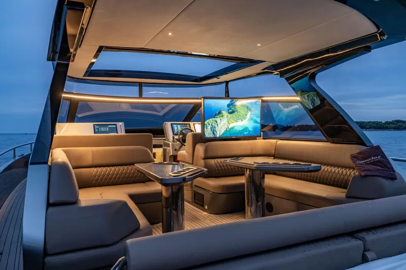 Virtus Yacht Photos Pics Luxurious interior of 2022 Steeler B50 AQUAZEN yacht with modern seating and panoramic views.