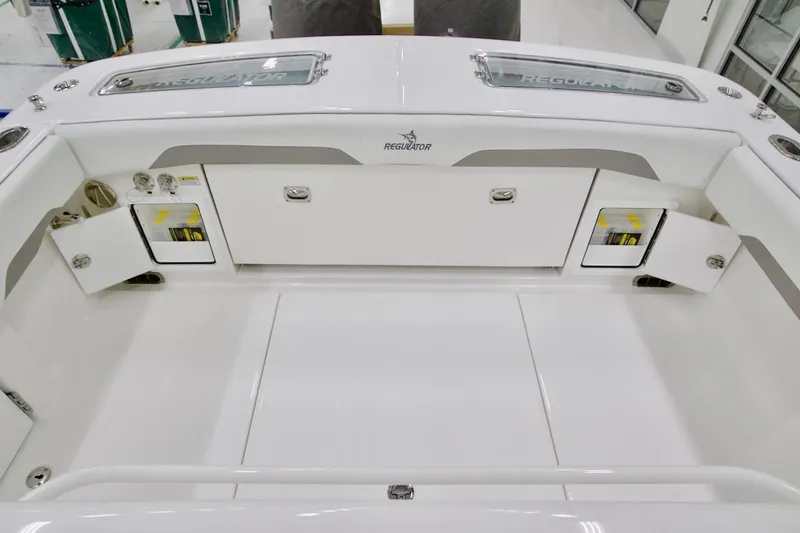 31-406 Yacht Photos Pics 2026 Regulator 31 boat interior with storage compartments and sleek white design.