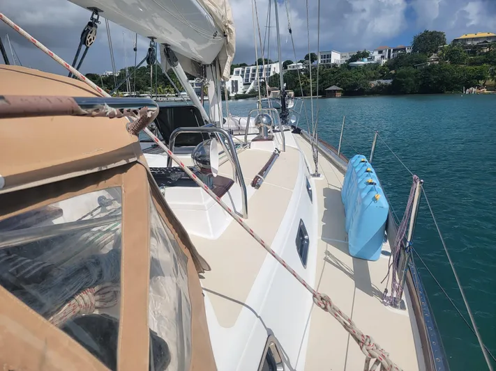 Rio Yacht Photos Pics Sailing yacht Tartan 4300, 2008 model, docked in a scenic marina.