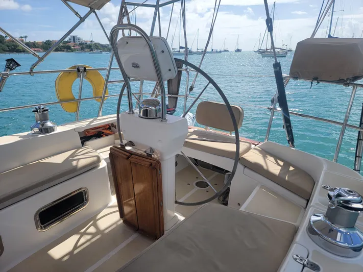 Rio Yacht Photos Pics Tartan 4300 sailboat cockpit, 2008 model, with ocean view and steering wheel.