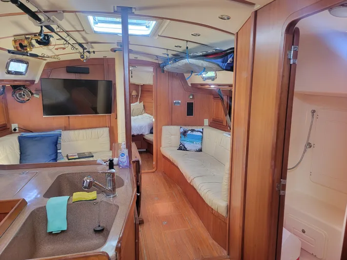 Rio Yacht Photos Pics Interior of 2008 Tartan 4300 yacht with cozy seating and modern amenities.