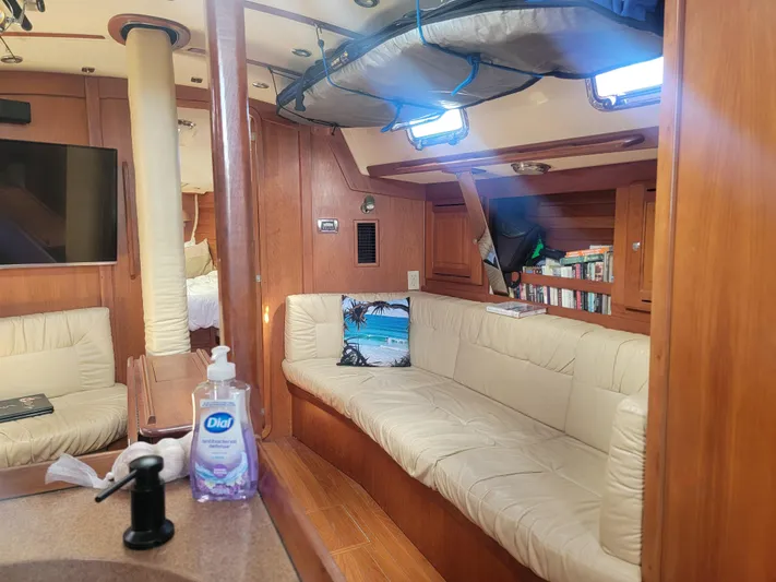 Rio Yacht Photos Pics Interior of 2008 Tartan 4300 yacht with cozy seating and wooden finishes.