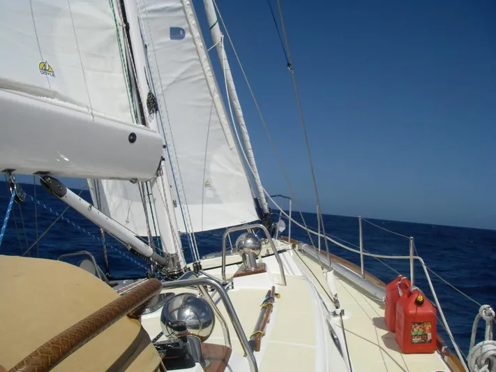 Rio Yacht Photos Pics Sailing on a 2008 Tartan 4300 yacht with clear blue skies and ocean.