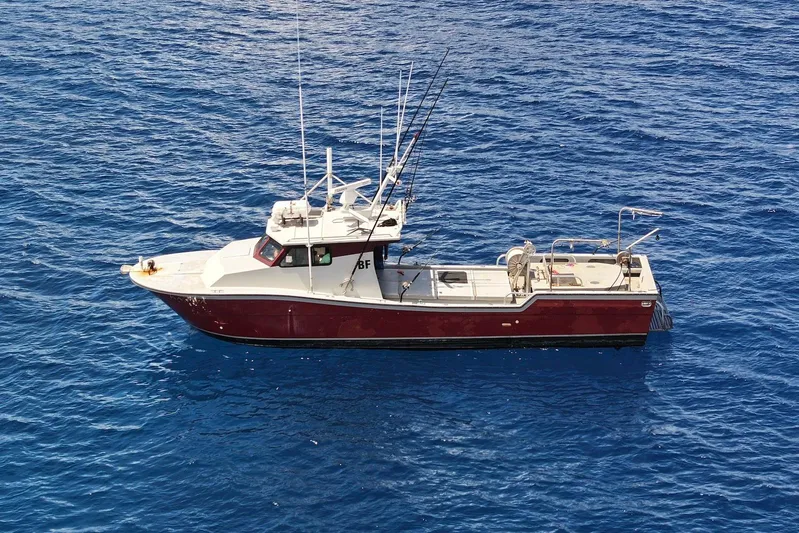  Yacht Photos Pics Custom Hoku 40 boat from 2018 on blue ocean waters.