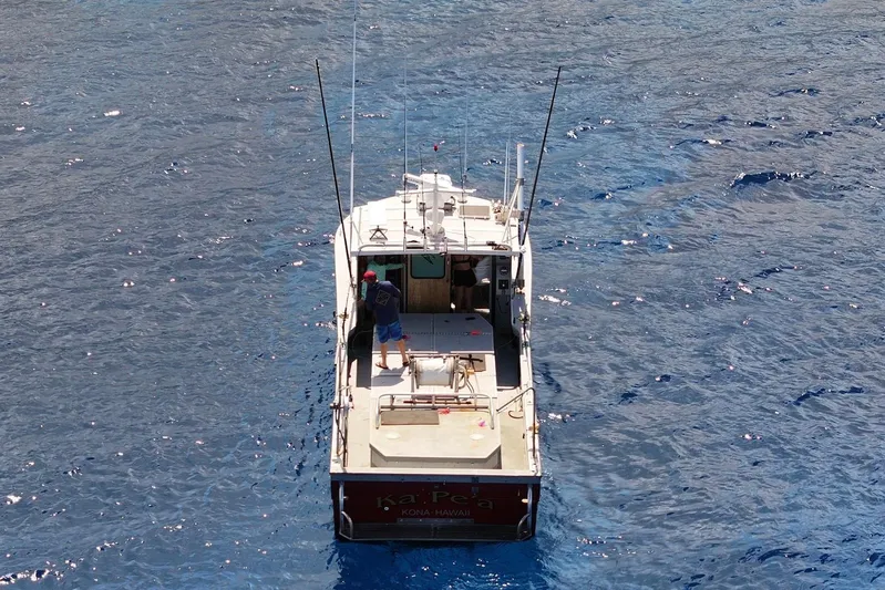  Yacht Photos Pics Fishing boat "Hoku 40" on blue ocean waters, 2018 model, aerial view.