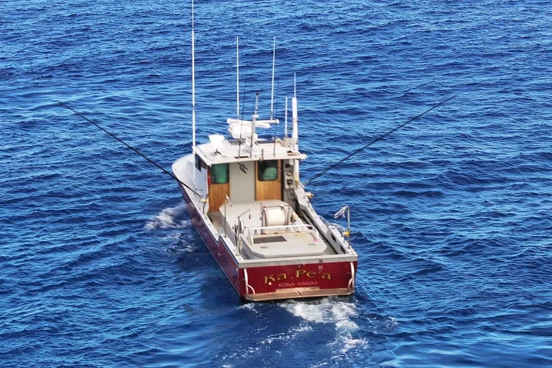  Yacht Photos Pics Custom Hoku 40 boat navigating blue ocean waters, 2018 model.