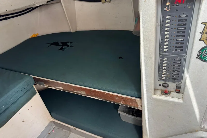  Yacht Photos Pics Interior of 2018 Custom Hoku 40 boat with control panel and seating area.