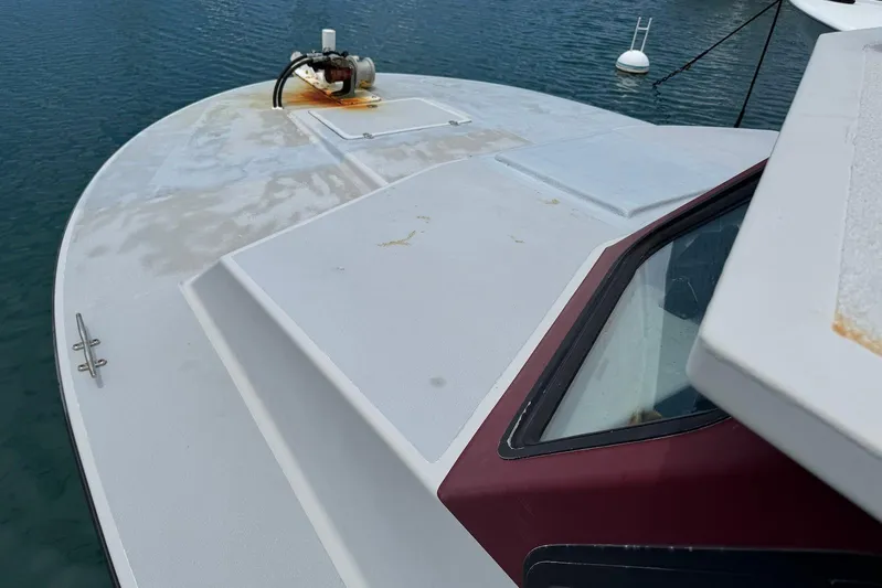  Yacht Photos Pics Custom Hoku 40 boat deck, 2018 model, on calm water.