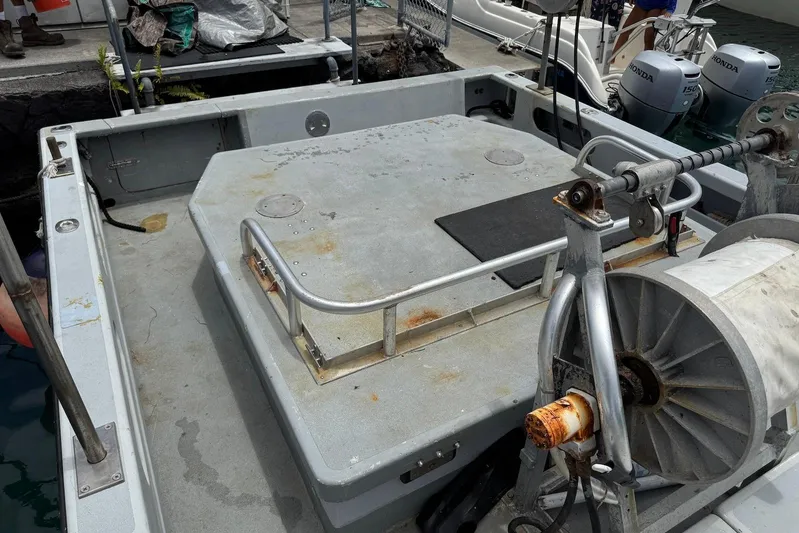  Yacht Photos Pics Deck of a 2018 Custom Hoku 40 boat with winch and railing.