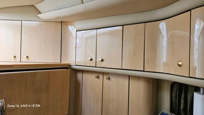 Dolce Vita Yacht Photos Pics Interior cabinetry of a 1999 Sea Ray 540 Sundancer yacht.