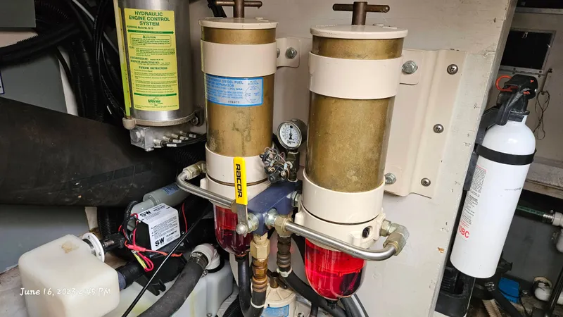 Dolce Vita Yacht Photos Pics Engine room of a 1999 Sea Ray 540 Sundancer with hydraulic engine control system.