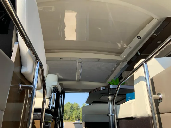  Yacht Photos Pics Interior view of 2018 Carver C52 Coupe yacht, featuring sleek design and modern furnishings.