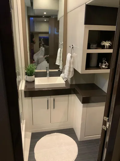  Yacht Photos Pics Modern bathroom in 2018 Carver C52 Coupe yacht with sleek fixtures and decor.