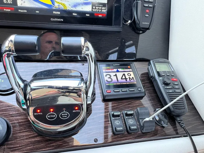  Yacht Photos Pics Control panel of a 2018 Carver C52 Coupe with navigation and communication devices.