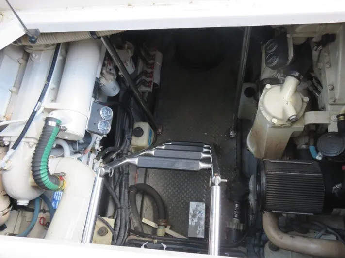  Yacht Photos Pics Engine room of a 2002 Sea Ray 450 Express Bridge yacht.