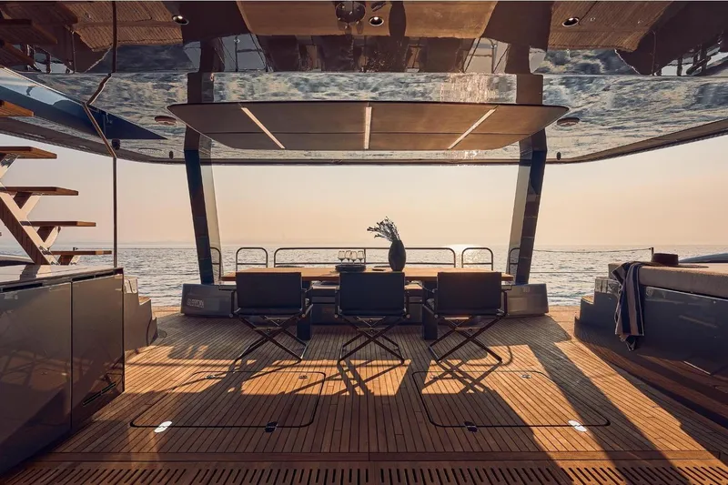  Yacht Photos Pics Luxurious Sunreef 60 Power yacht deck with elegant seating, overlooking serene ocean view, 2026 model.