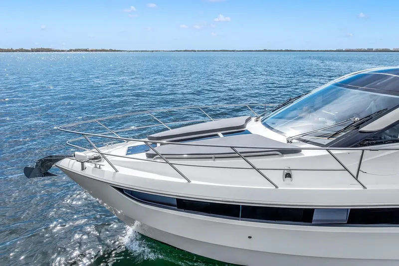  Yacht Photos Pics 2018 Galeon 430 HTC yacht cruising on open water under clear blue skies.