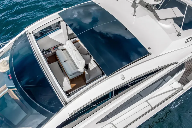  Yacht Photos Pics Aerial view of 2018 Galeon 430 HTC yacht with sleek design and open sunroof.