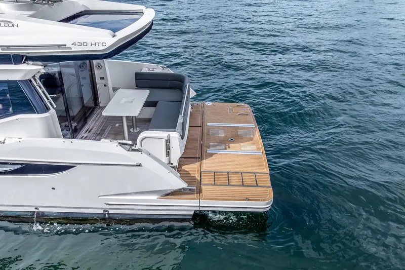  Yacht Photos Pics 2018 Galeon 430 HTC yacht with spacious deck and seating on calm water.
