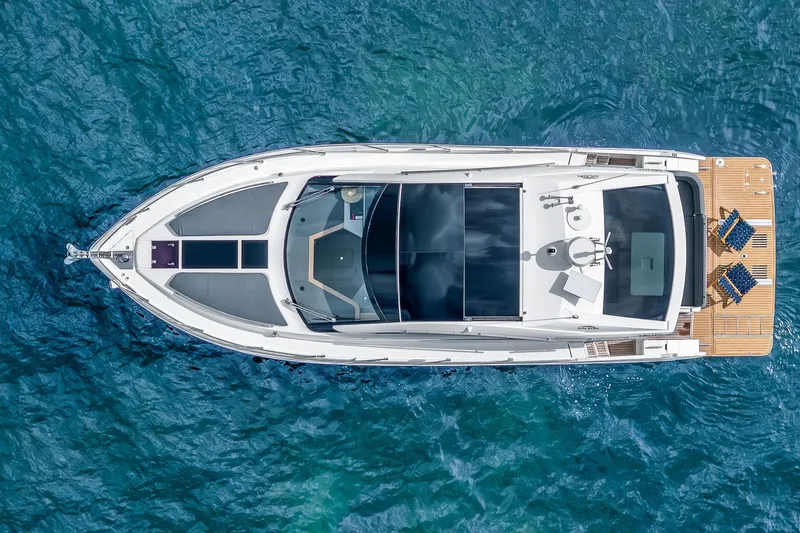  Yacht Photos Pics Overhead view of 2018 Galeon 430 HTC yacht on blue ocean water.
