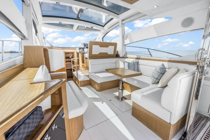  Yacht Photos Pics Luxurious interior of 2018 Galeon 430 HTC yacht with elegant seating and wooden accents.