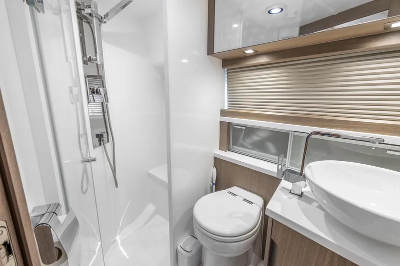  Yacht Photos Pics Modern bathroom in 2018 Galeon 430 HTC yacht with shower, toilet, and sink.