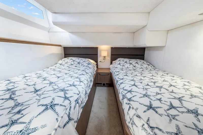  Yacht Photos Pics Twin beds in Galeon 430 HTC yacht cabin, starfish-patterned bedding, modern design, 2018 model.