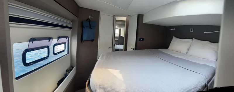  Yacht Photos Pics Luxurious cabin interior of 2021 Bali 4.8 yacht with ocean view window.