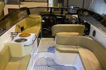  Yacht Photos Pics 2024 Hanover 305 White & Gray Edition boat interior with luxurious seating and modern dashboard.