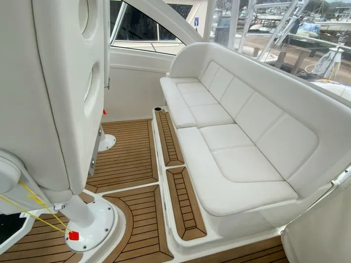 Salty Bear Yacht Photos Pics 2022 Albemarle 360 Express Fisherman interior with white seating and teak flooring.