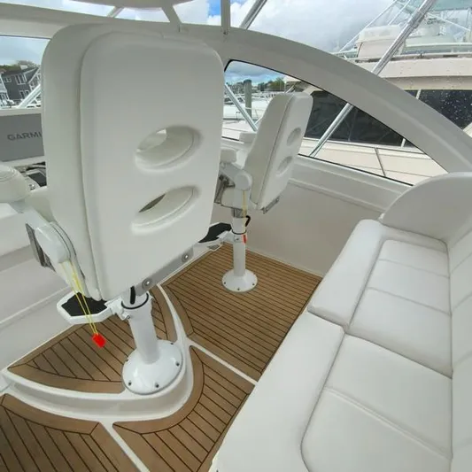 Salty Bear Yacht Photos Pics 2022 Albemarle 360 Express Fisherman interior with white seating and wooden flooring.