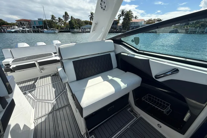  Yacht Photos Pics 2019 Monterey 385 Super Express boat interior with luxurious seating and waterfront view.