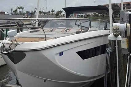  Yacht Photos Pics 2023 Hanover 377 boat docked at marina, sleek design, modern features.