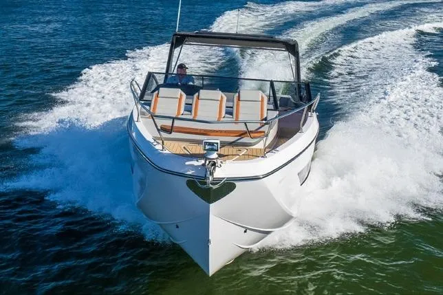  Yacht Photos Pics 2023 Hanover 377 boat cruising on open water, showcasing sleek design and powerful performance.