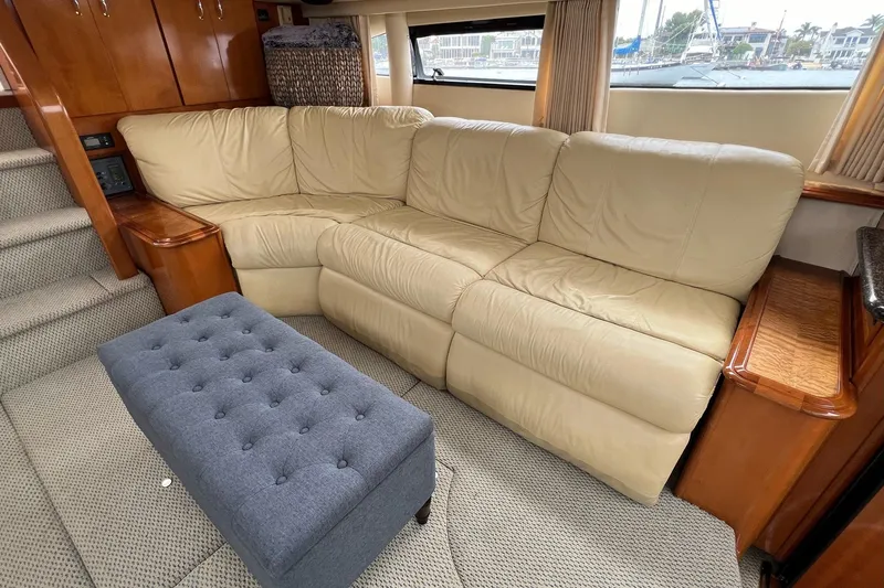  Yacht Photos Pics Luxurious interior of 2003 Carver 444 Cockpit Motor Yacht with beige leather sofa.