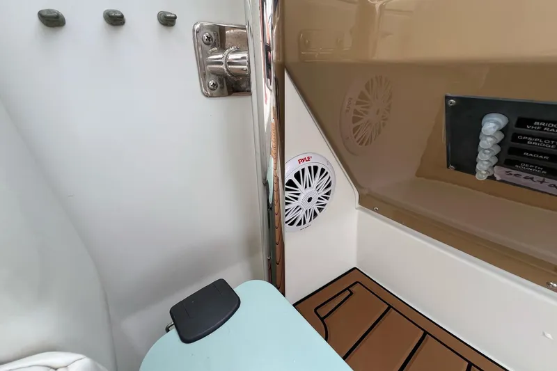  Yacht Photos Pics 2003 Carver 444 Cockpit Motor Yacht interior with speaker and control panel.