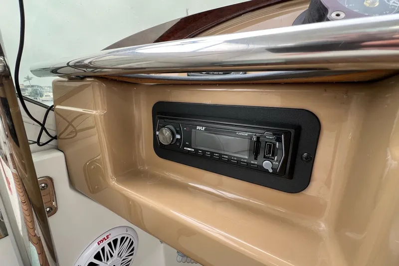  Yacht Photos Pics 2003 Carver 444 Cockpit Motor Yacht dashboard with Pyle stereo system.