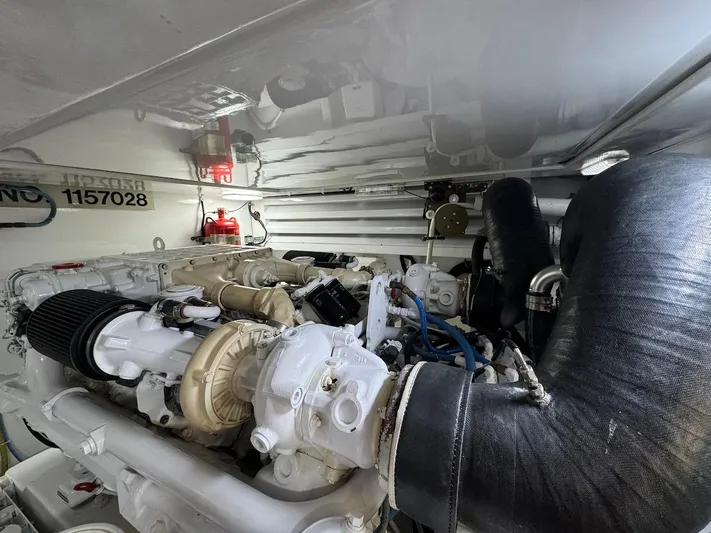  Yacht Photos Pics Engine room of 2004 Bertram 510 Convertible yacht, showcasing mechanical components.