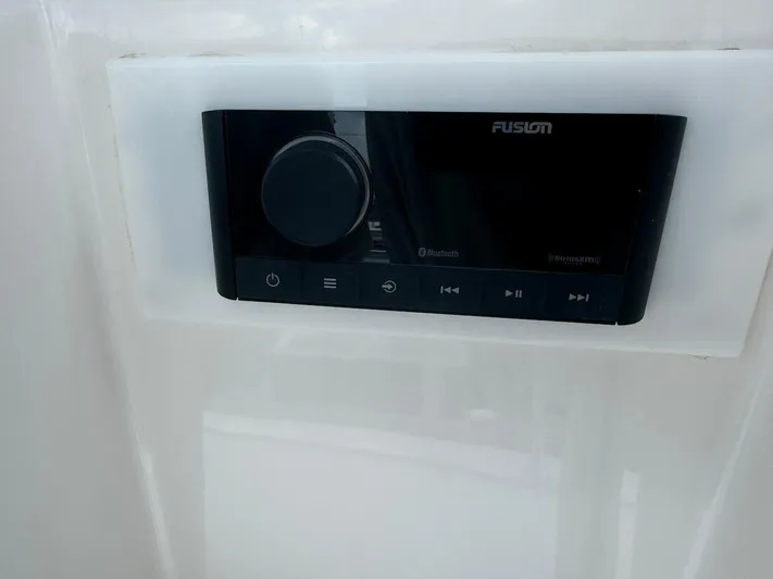  Yacht Photos Pics Fusion stereo system on 2004 Bertram 510 Convertible yacht dashboard.