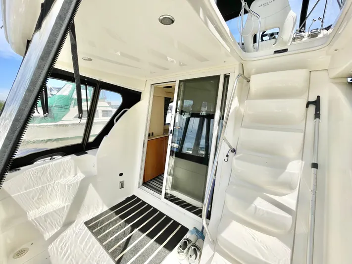  Yacht Photos Pics 2003 Meridian 341 Sedan interior with stairs, sliding door, and windows.