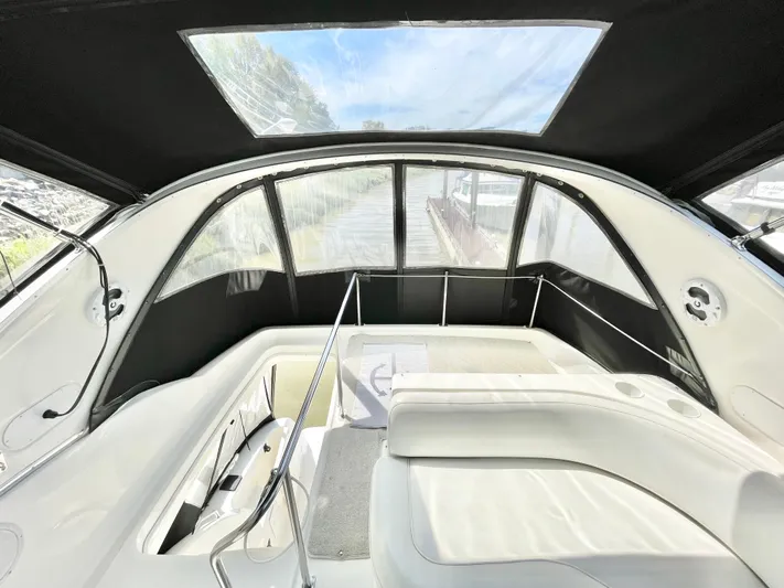  Yacht Photos Pics Interior of 2003 Meridian 341 Sedan yacht with panoramic windows and sleek seating.