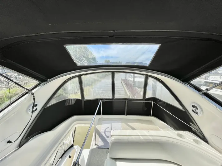  Yacht Photos Pics Interior view of 2003 Meridian 341 Sedan yacht with panoramic windows and seating.