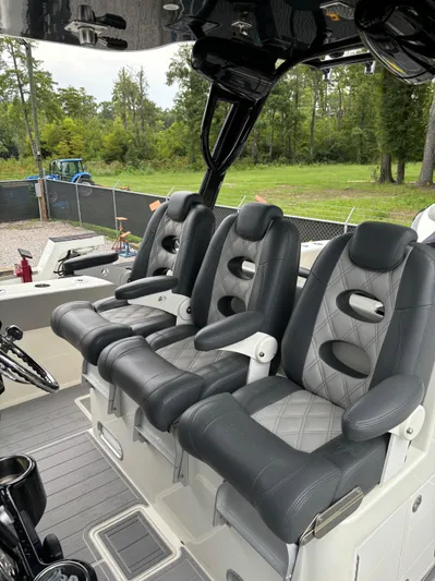  Yacht Photos Pics 2017 HCB Speciale boat with luxurious black and gray seating.